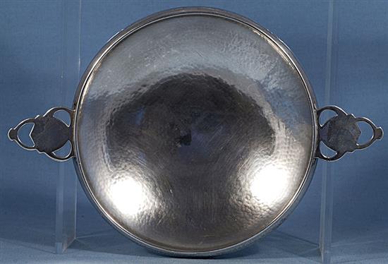 A George V Arts & Crafts silver bowl, by Albert Edward Jones, Diameter to handles 281mm, weight 9.8oz/305grms